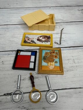 Bundle of three Mini Brands Masterpiece paintings, accessories